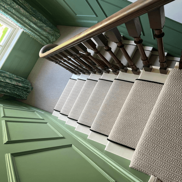 Stair runner fitting by First Choice Flooring. 